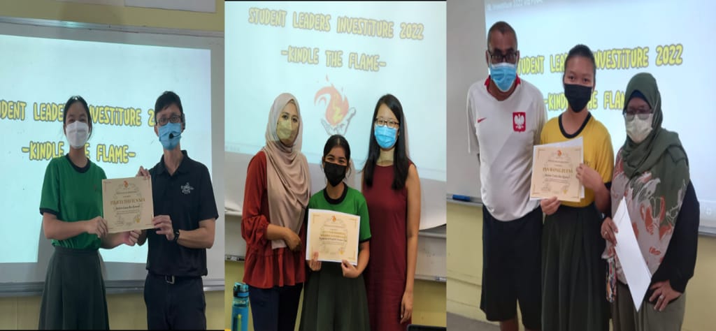 Three groups of masked students holding certificates at Student Leaders Investiture 2022 event indoors.